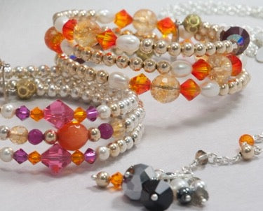 SARI Multi strand bracelet with Swarovski crystals, freshwater cultured pearls, semi precious stones & gold filled balls